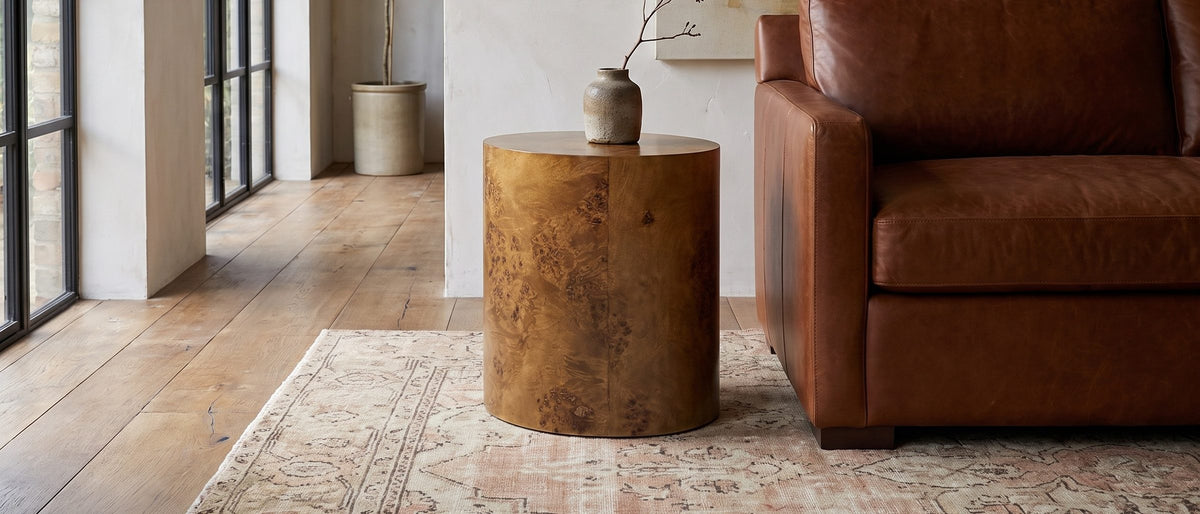 Fiumefreddo Walnut Burl Oval Pillar Side Table in the room
