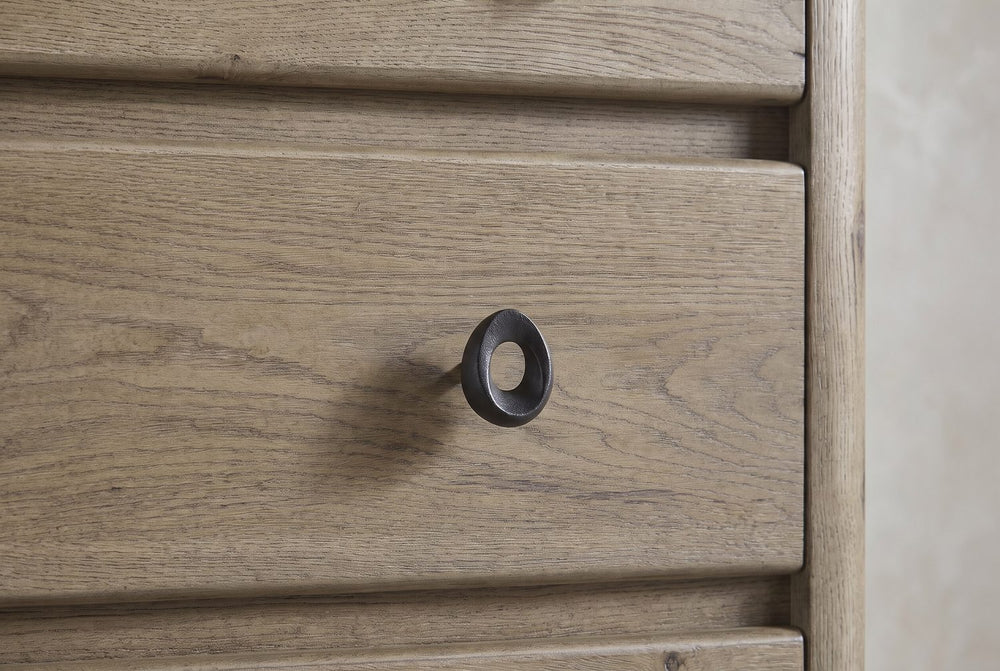 A pebble-shaped ring