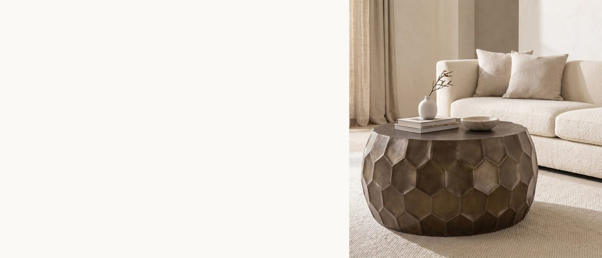 Faceted bronze, hammered top. - Gavi 32-Inch Round Antique Bronze Faceted Aluminum Drum Coffee Table