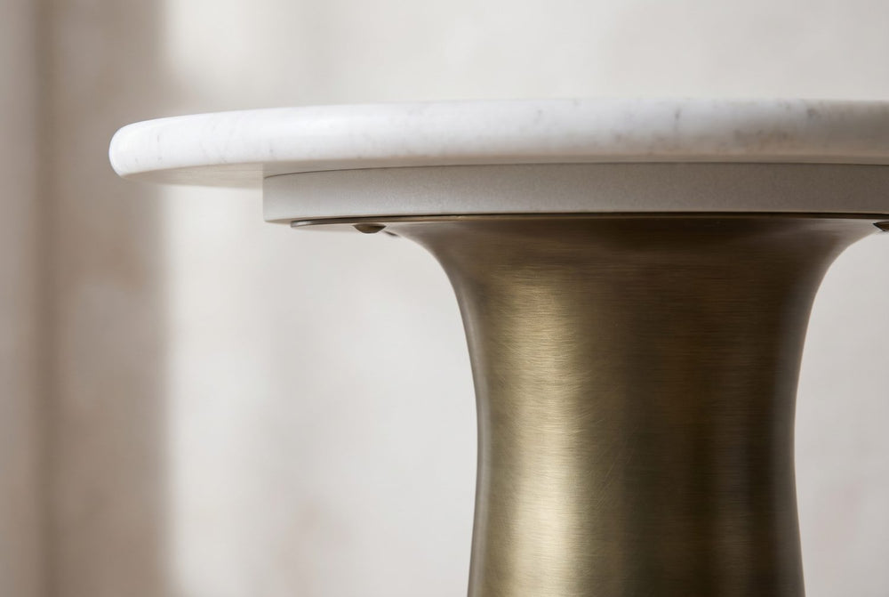 Marble over a flared base