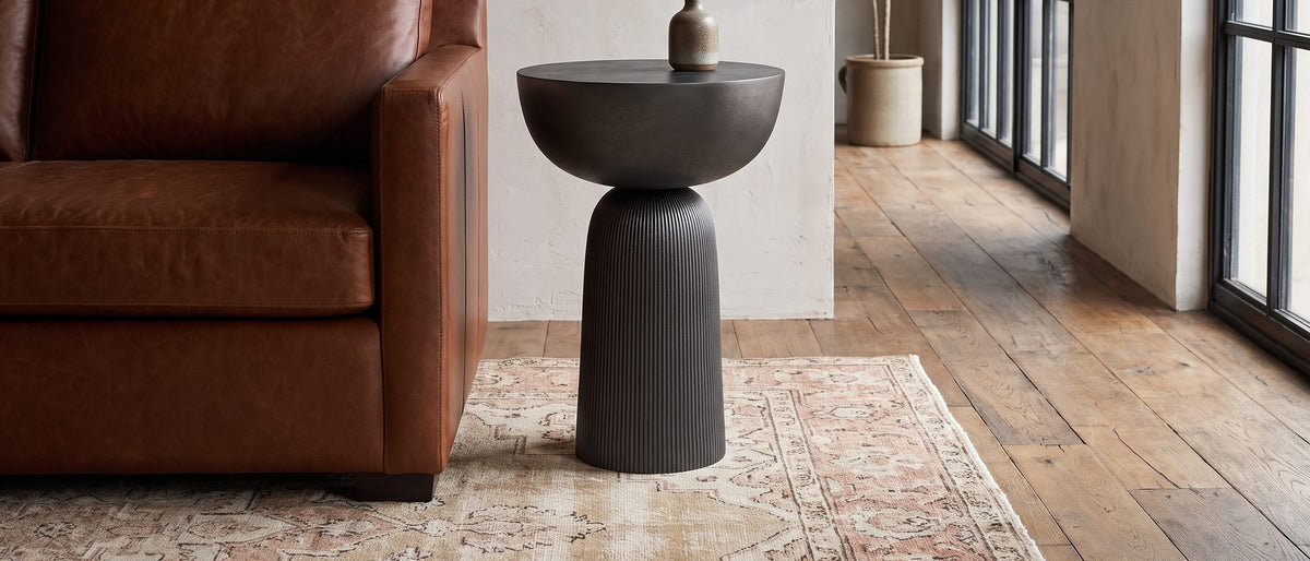 Irsina Cast Aluminum Tulip Pedestal Side Table in the room