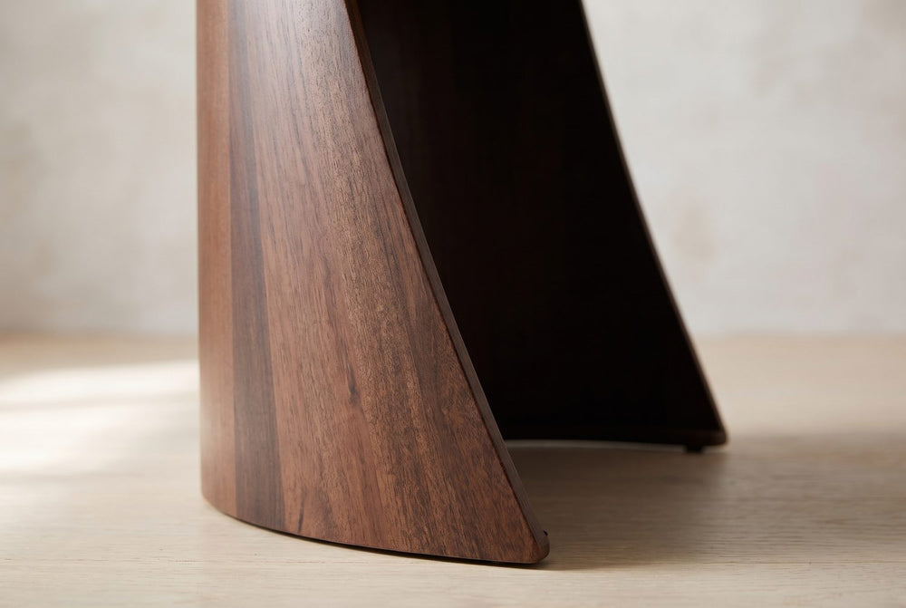 A curved shell for a base