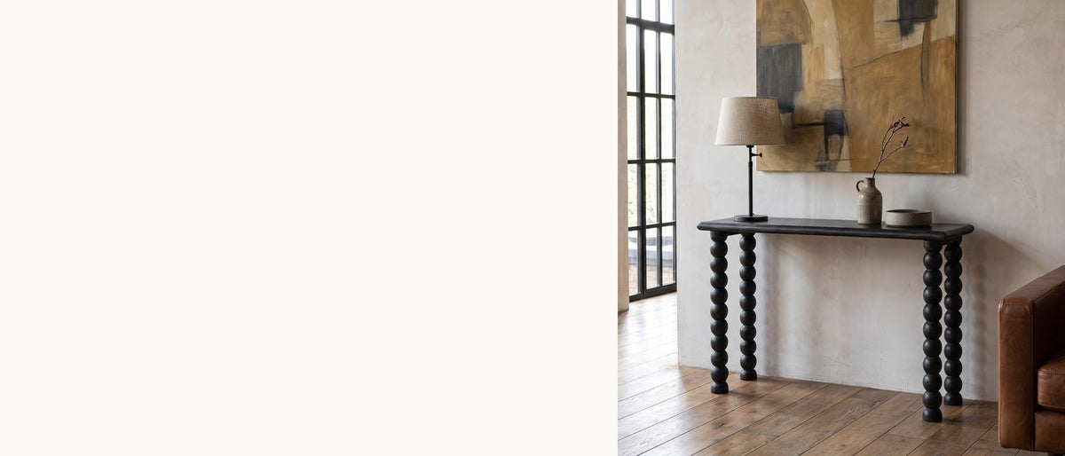 Four columns of black beads. - Lizzano Black Mango Wood Bobbin Console Table