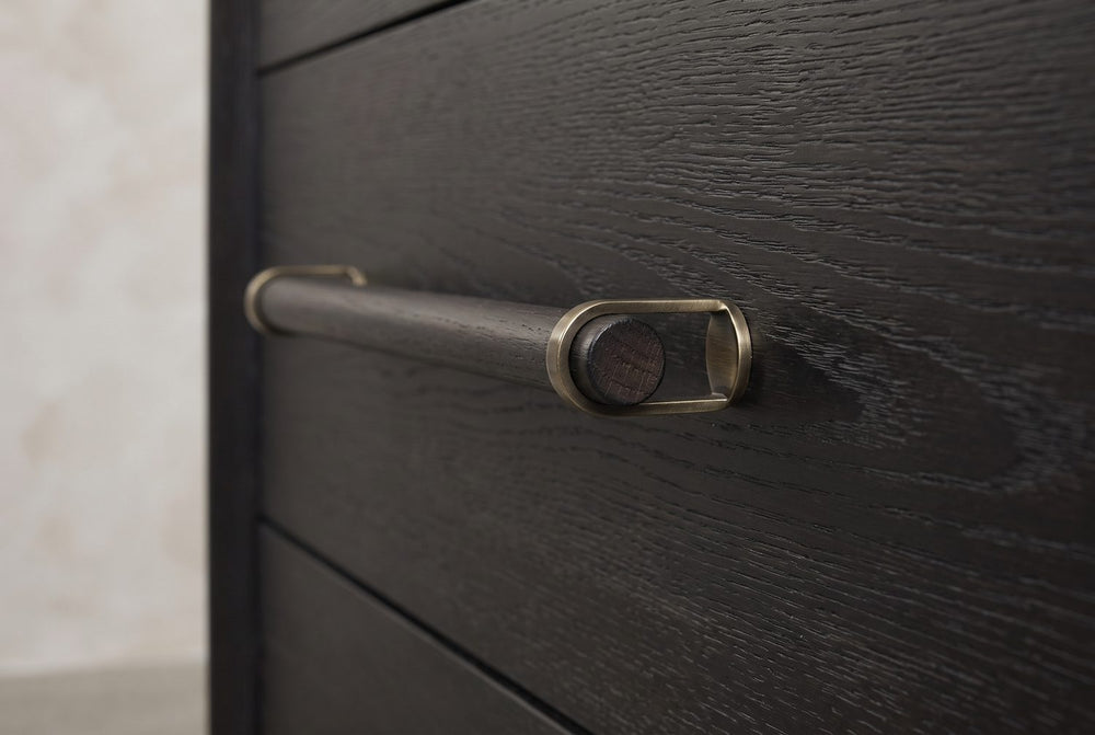 Wooden dowel, brass loops