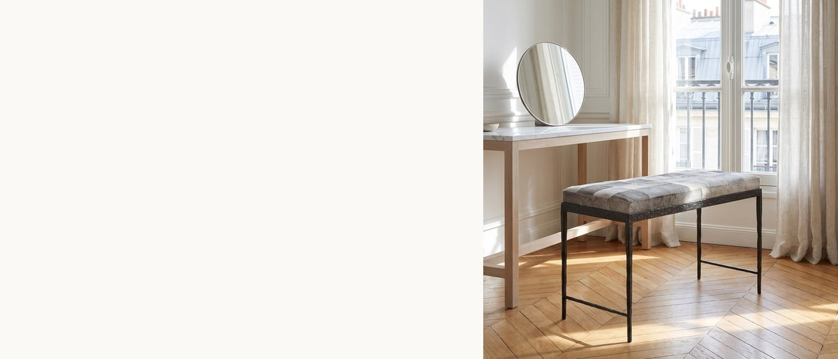Soft hide, hammered iron. - Luzzi 28-Inch Gray Hair-on-Hide Patchwork Iron Bench, Seats 1