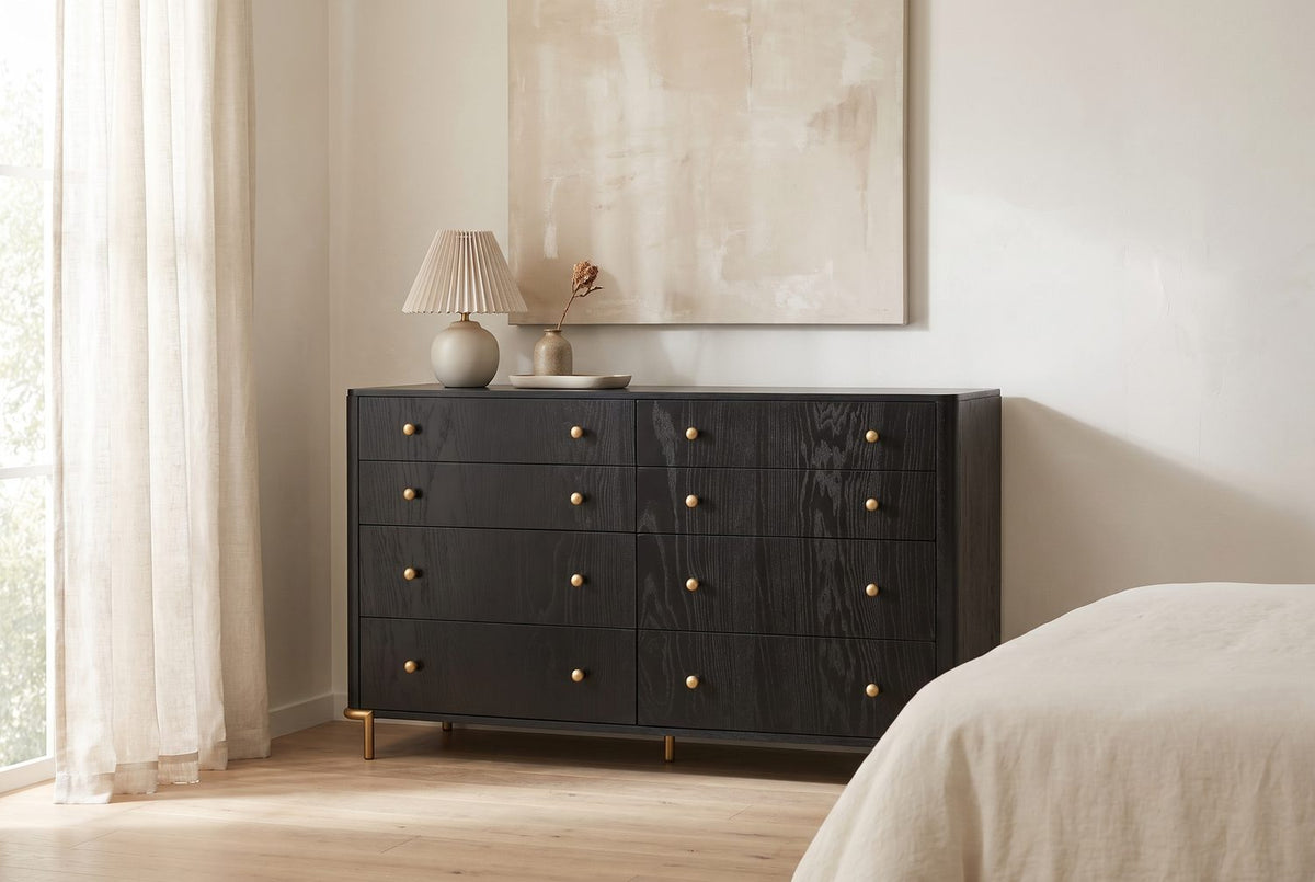 Black and gold, softly curved. - Malcesine 63-Inch Wire-Brushed Black 8-Drawer Dresser