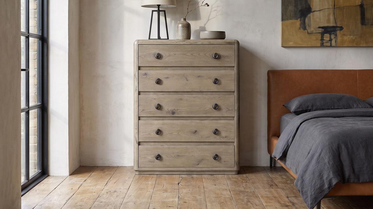Soft greige, dark rings. - Maniago 42-Inch Weathered Natural Oak 5-Drawer Chest