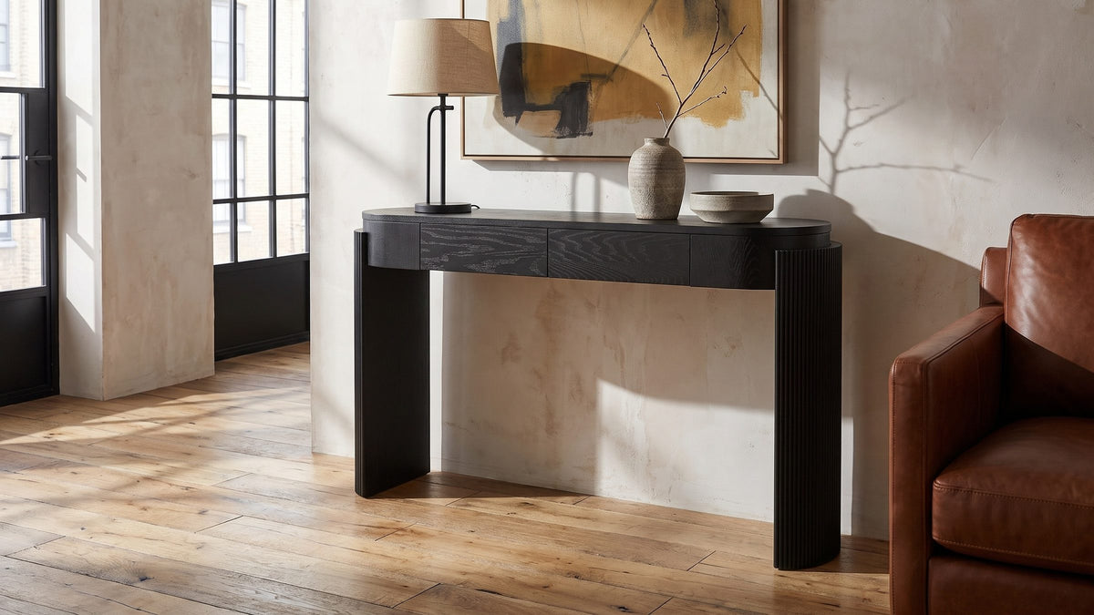 A black line with rounded ends. - Minervino Black Oak Fluted Racetrack Console Table