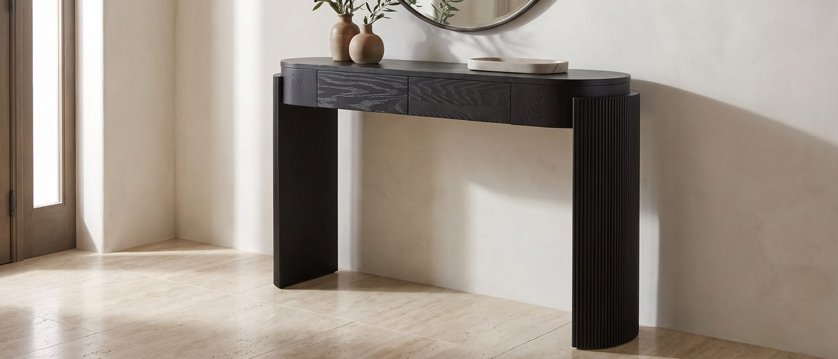 Minervino Black Oak Fluted Racetrack Console Table in the room