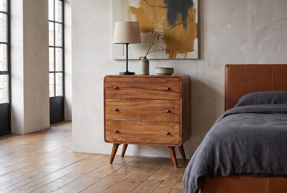 Three drawers on splayed legs