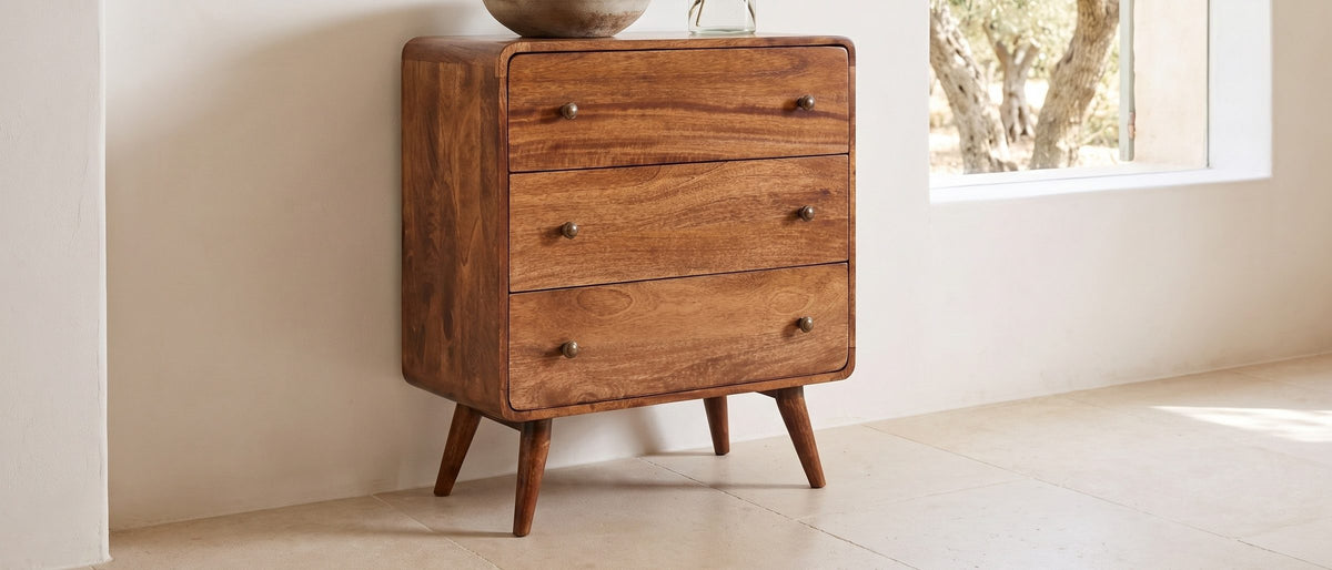 Mira 28-Inch Honey Caramel Solid Mango 3-Drawer Chest in the room