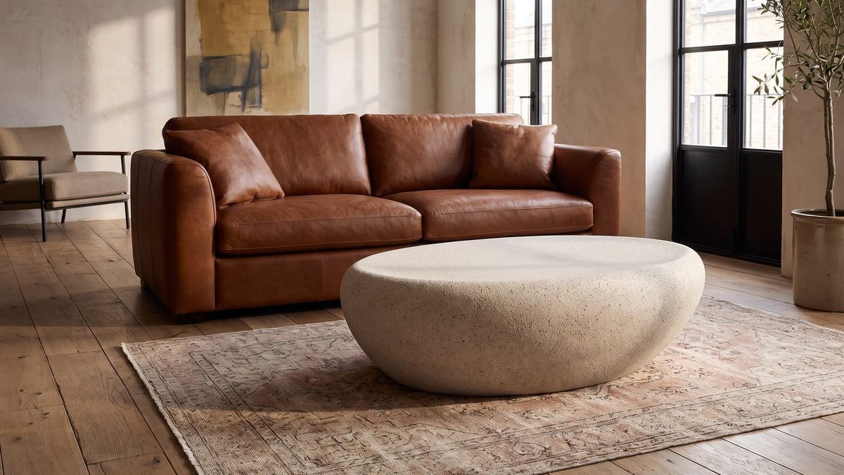 A pale stone for the room. - Modica Cream Fiberglass Pebble Coffee Table