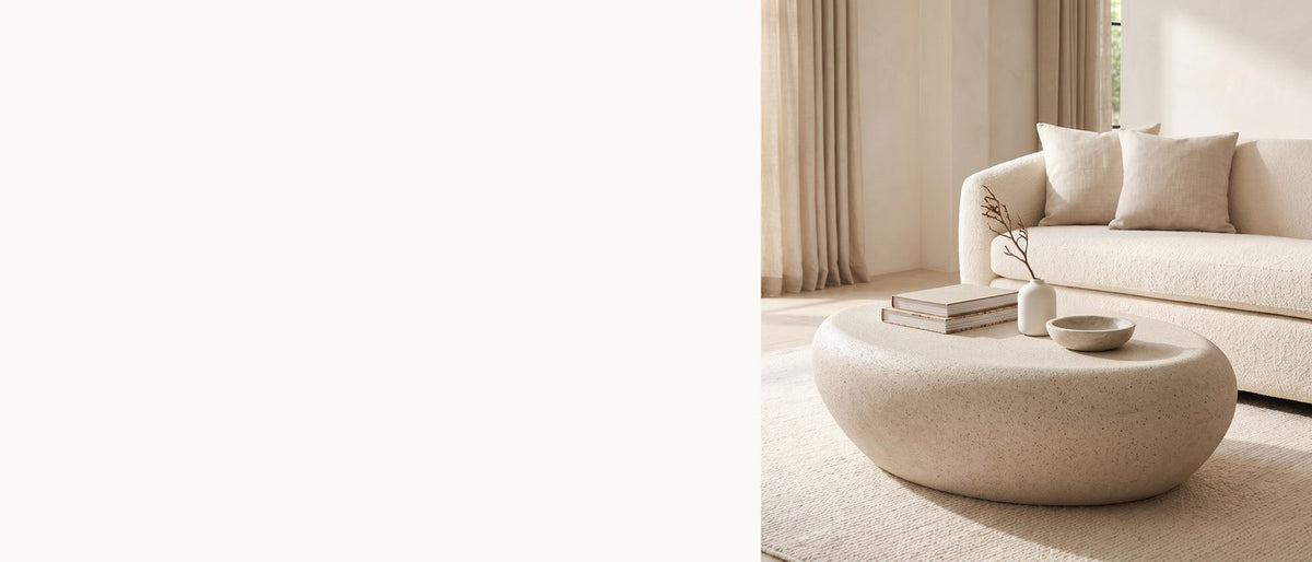 A river stone, in cream. - Modica Cream Fiberglass Pebble Coffee Table