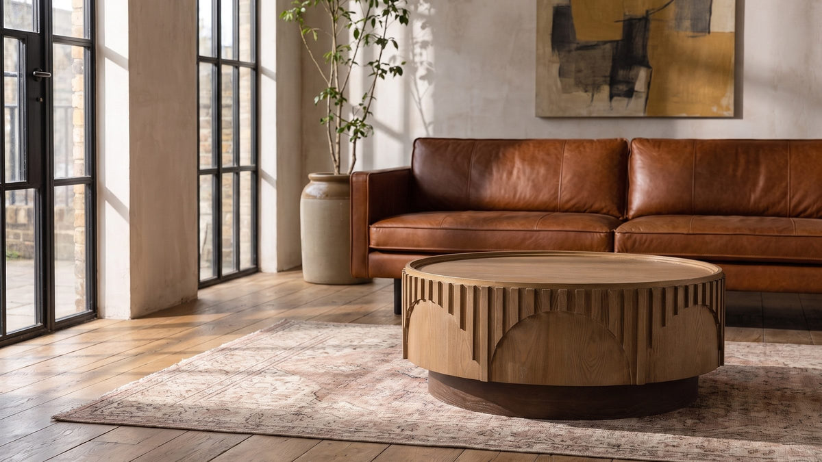 Warm ash, a line of gold. - Mondovi 36-Inch Round Carved Limed Ash Drum Coffee Table