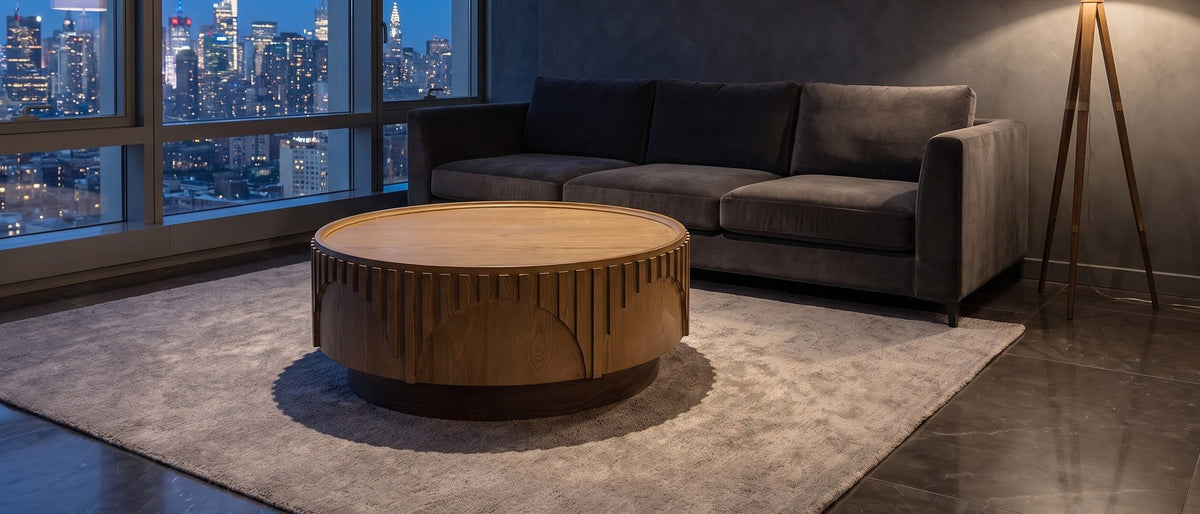 Mondovi 36-Inch Round Carved Limed Ash Drum Coffee Table in the room