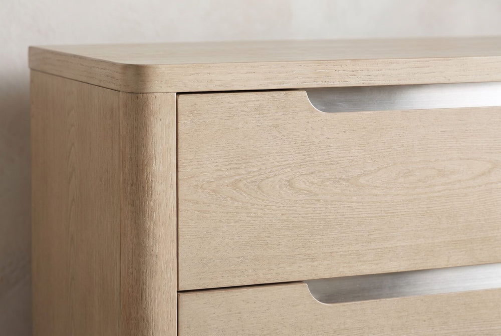 A pull cut into the drawer