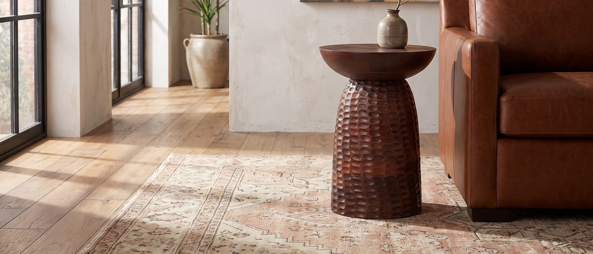Montalbano Carved Mango Pedestal Side Table in the room