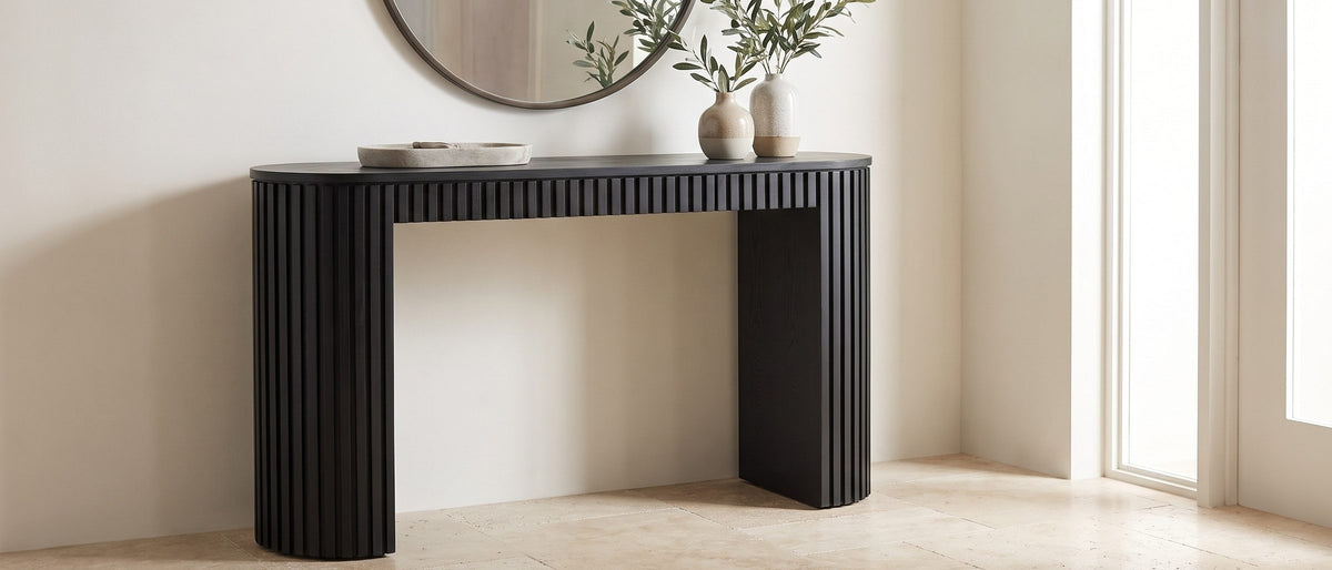 Monterosso Black Wood Veneer Fluted Oval Console Table in the room