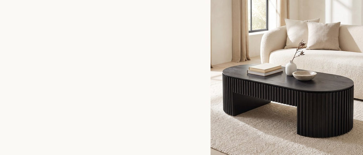Black slats, a bridge in the middle. - Monterosso Black Wood Veneer Fluted Oval Coffee Table