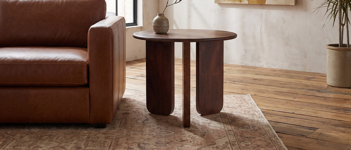 Morciano Mango Wood Round Side Table in the room