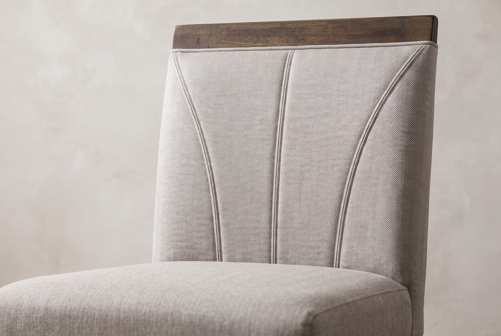 A fan of seams, a wood cap