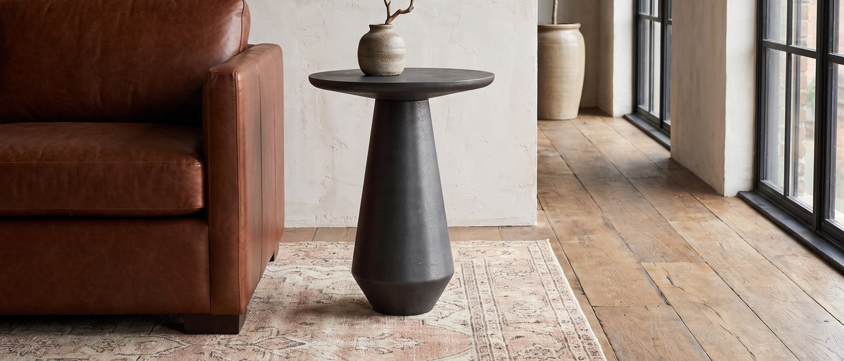 Navelli Graphite Cast Aluminum Pedestal Side Table in the room