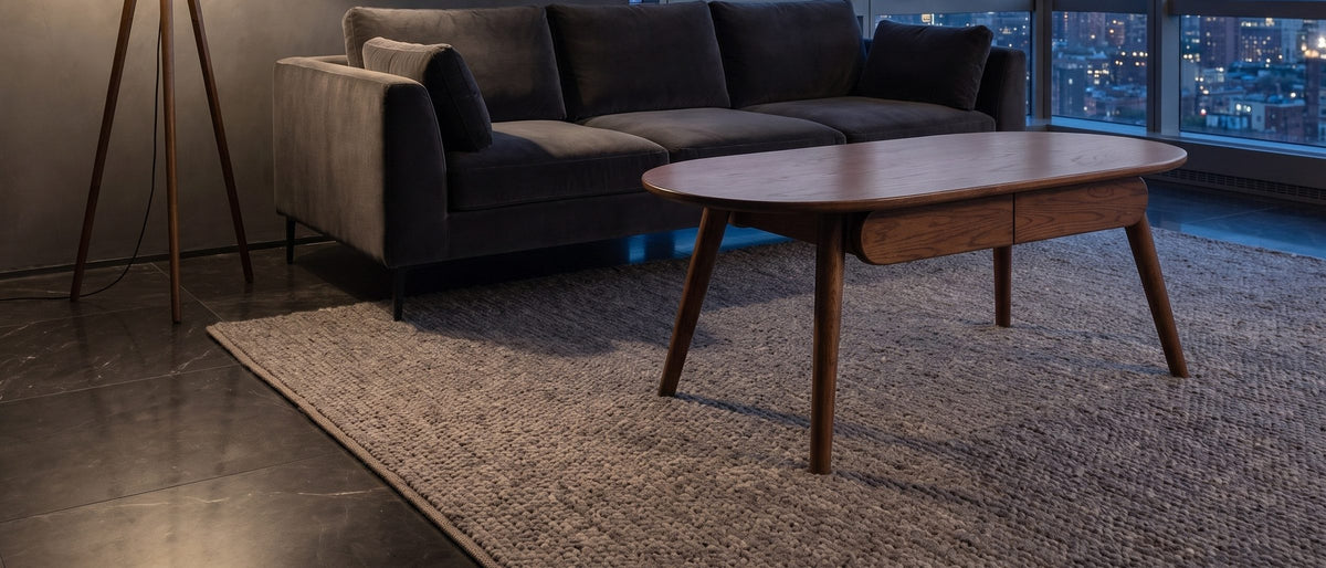 Neive 47-Inch Oval Walnut-Stained Solid Oak Coffee Table with 2 Drawers in the room