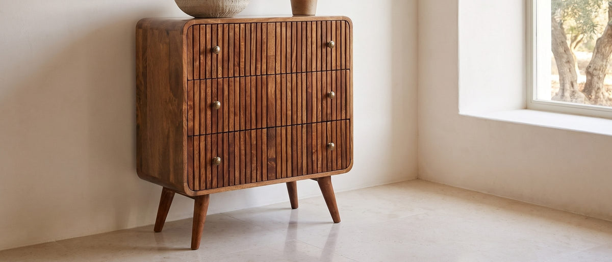 Noale 28-Inch Honey Caramel Solid Mango 3-Drawer Chest in the room