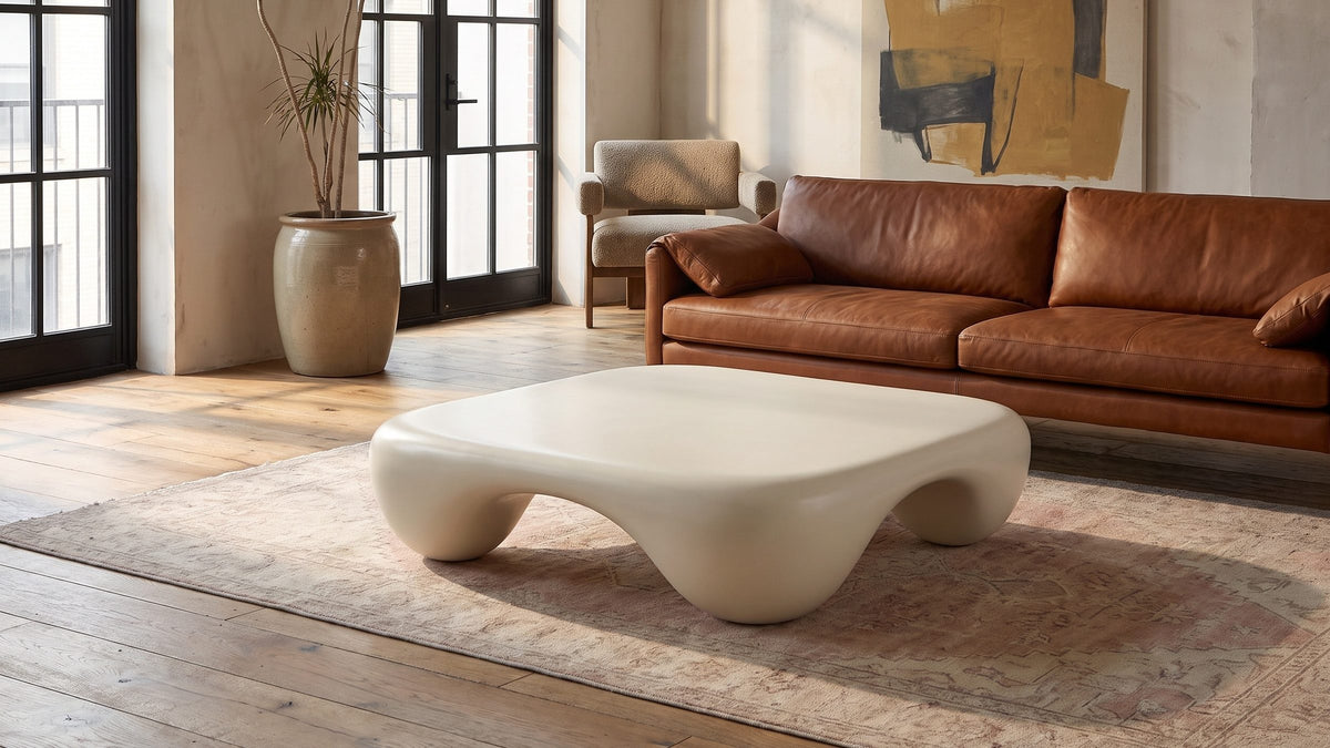 A soft white centre. - Noli White Sculpted Fiberglass Coffee Table