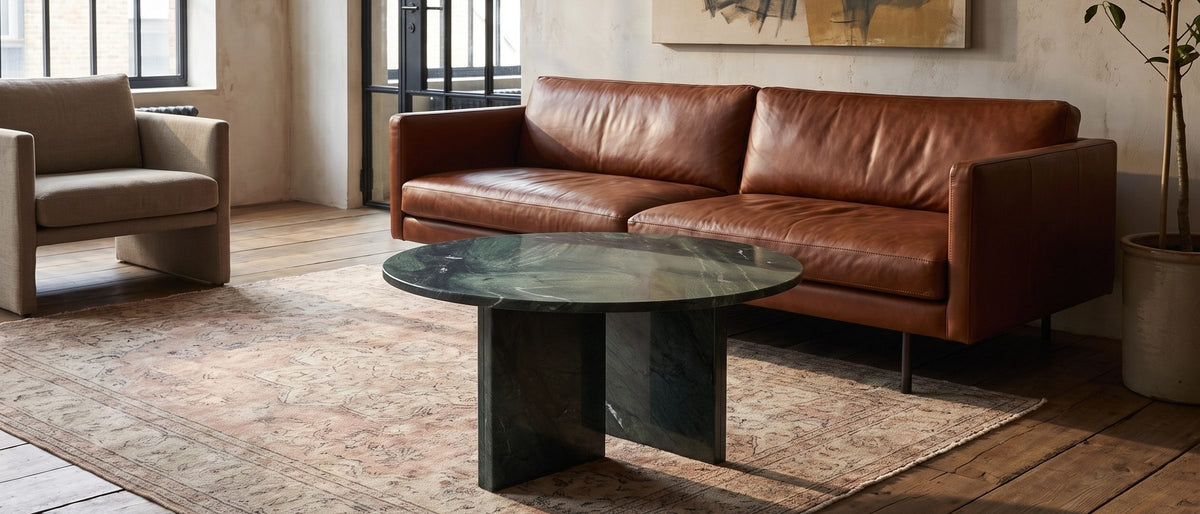 Orosei Verde Marble Coffee Table in the room