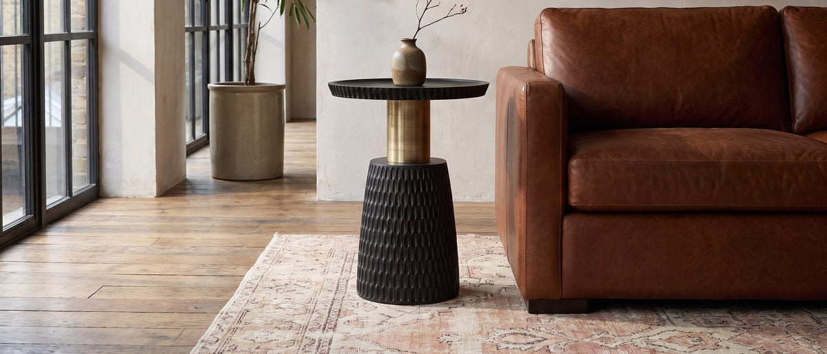 Orsomarso Carved Black Mango Pedestal Side Table in the room