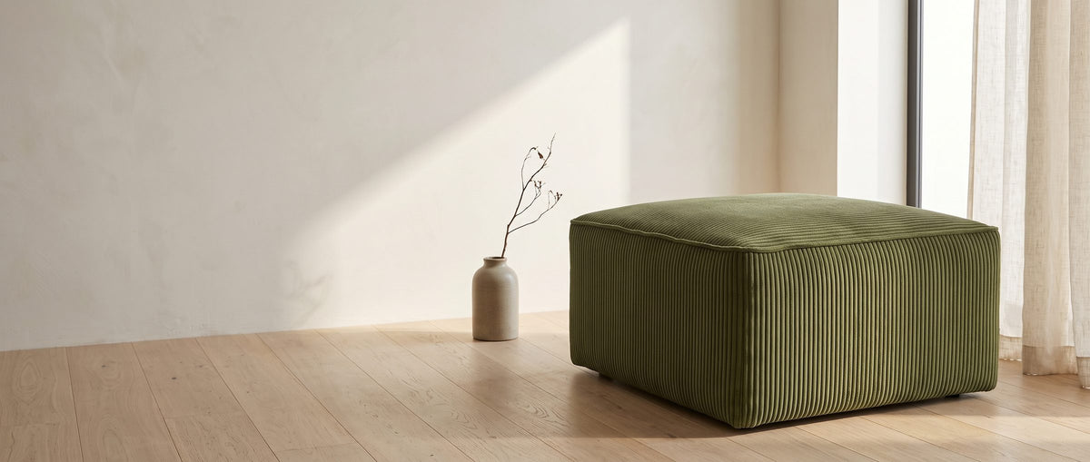Low, square, and endlessly useful. - Orvieto Corduroy Cocktail Ottoman