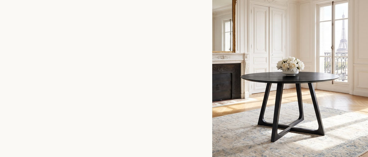 One dark, graceful shape. - Paola 47.5-Inch Round Black Ash Dining Table
