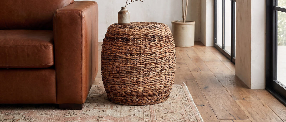 Parabita Woven Natural Fiber Barrel Side Table in the room
