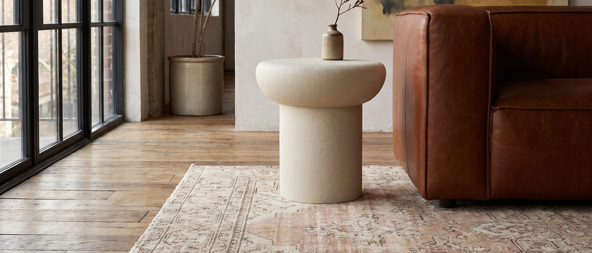 Pescocostanzo Cream Textured Fiberglass Mushroom Side Table in the room