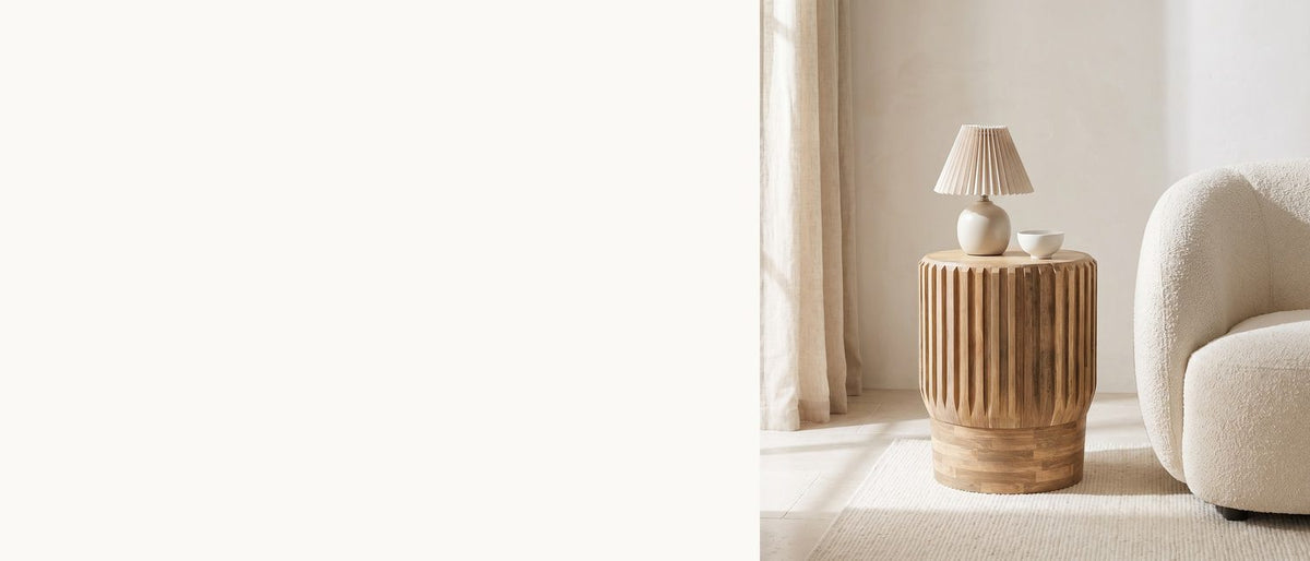 Ribs above, brickwork below. - Pievepelago Natural Mango Fluted Drum Side Table