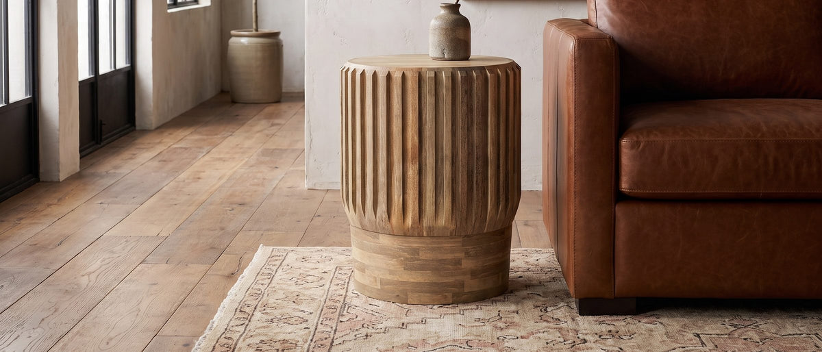 Pievepelago Natural Mango Fluted Drum Side Table in the room