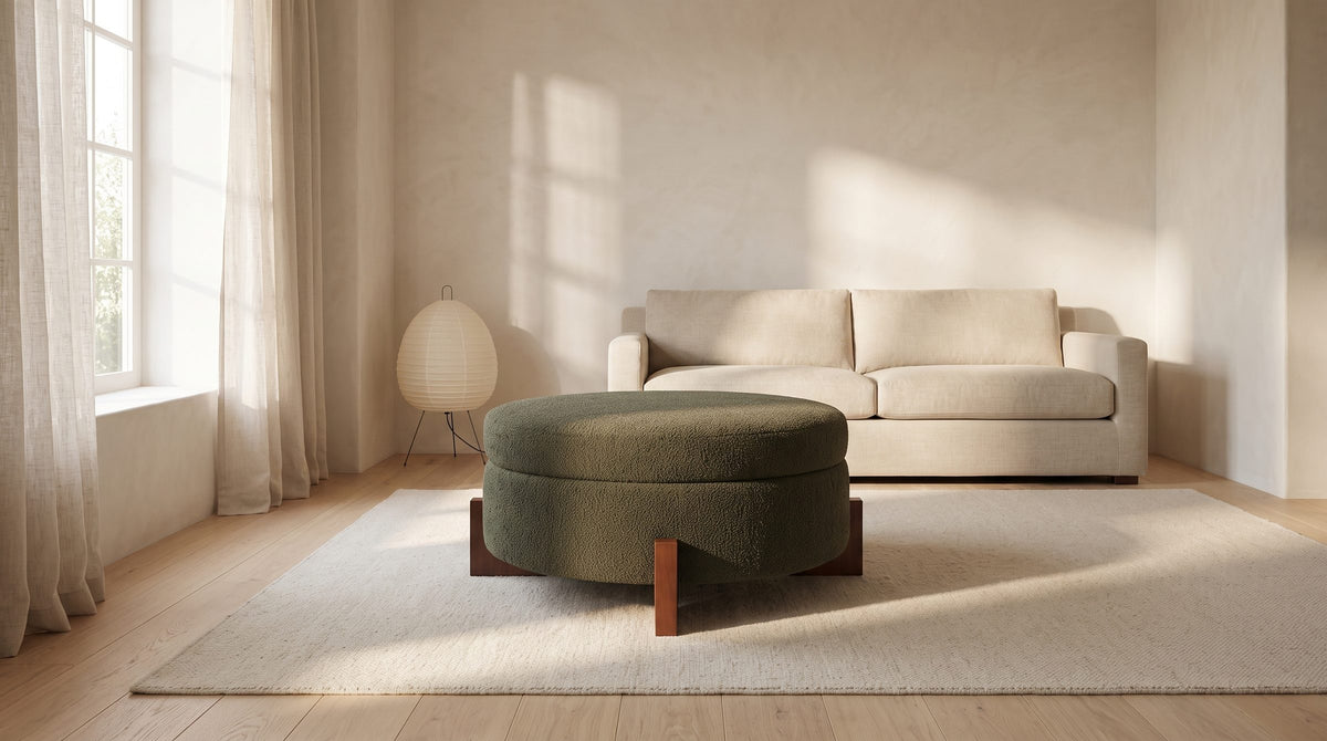 Portofino Round Storage Ottoman in the room