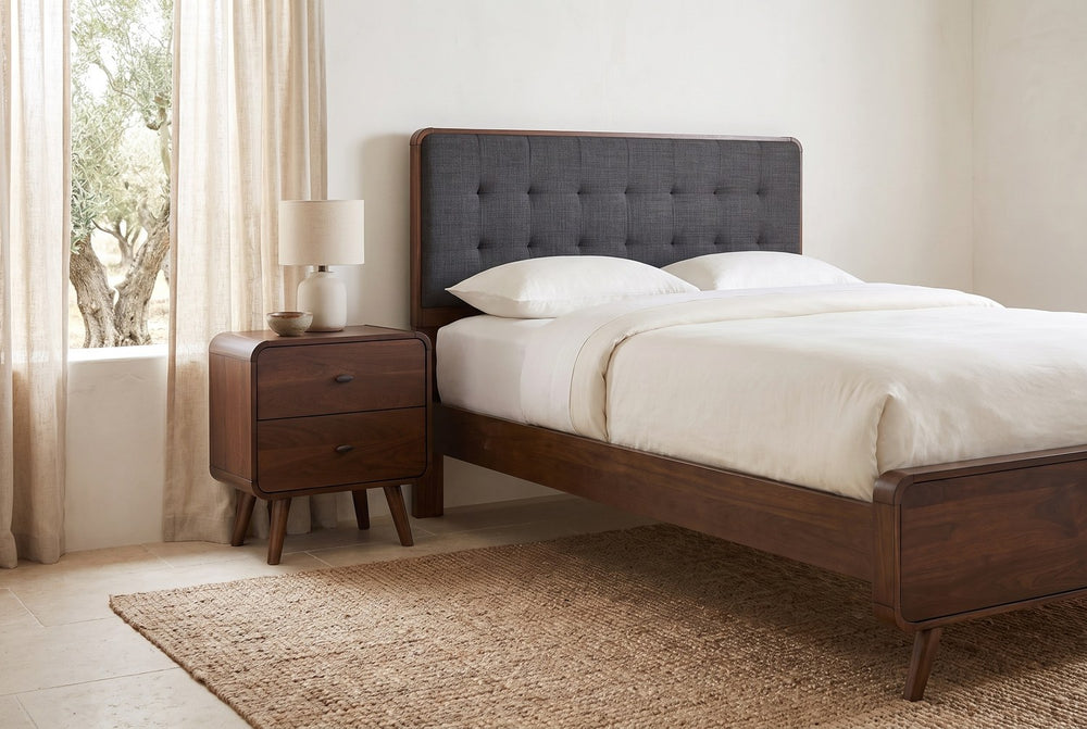 Beside the quilted headboard