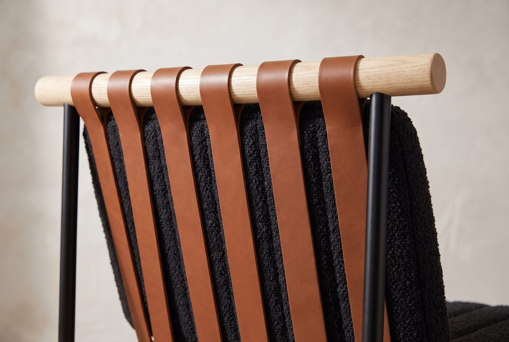 Straps over pale wood