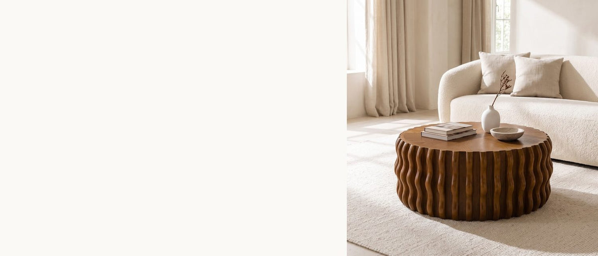 Carved waves, a sunburst top. - Rivoli 30-Inch Round Carved Wood Drum Coffee Table