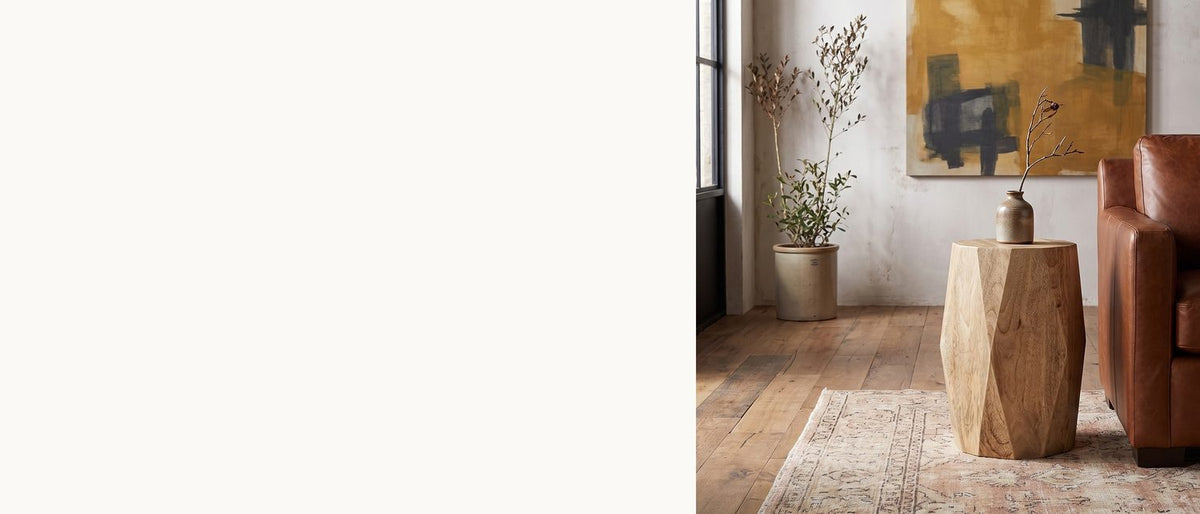 A log, cut into facets. - Rotondella Faceted Mango Drum Side Table