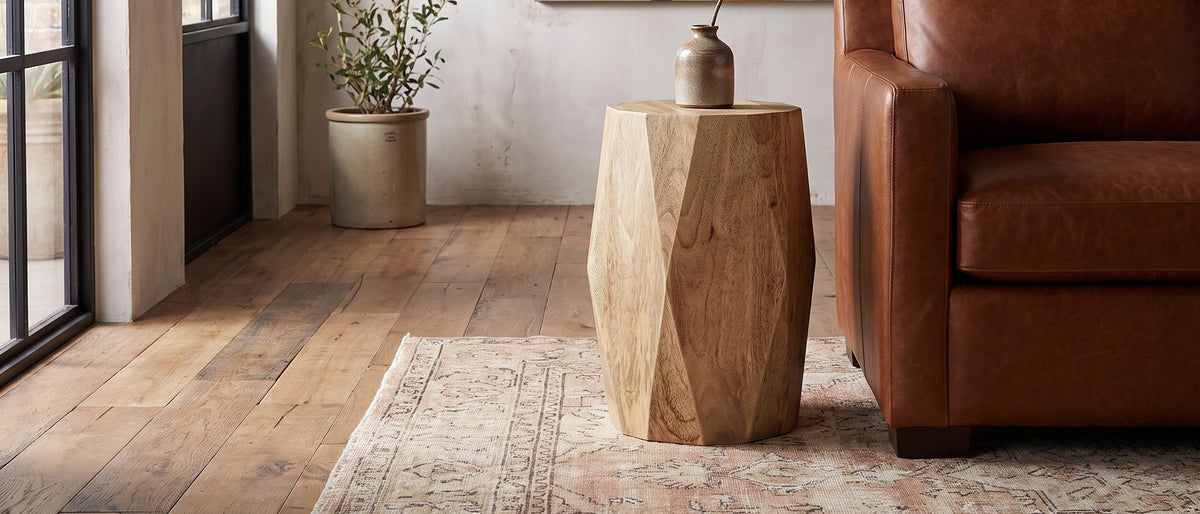 Rotondella Faceted Mango Drum Side Table in the room