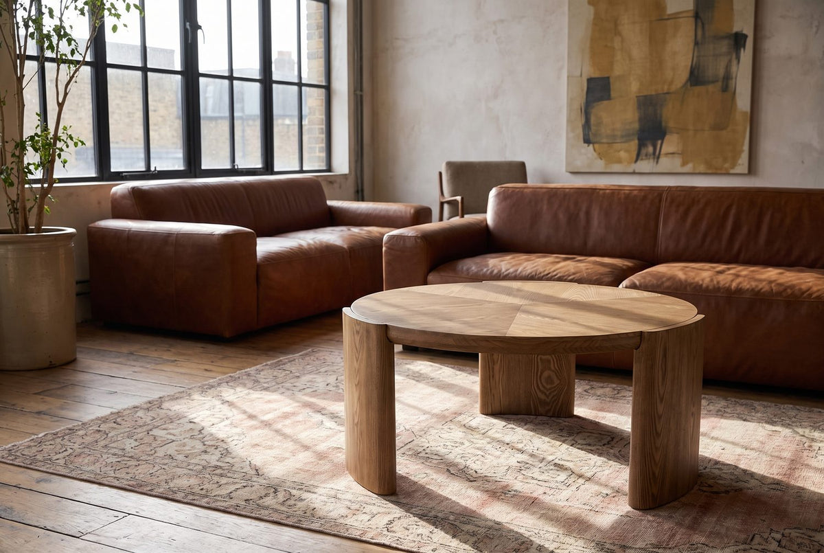 Rovereto Brown Ash Veneer Round Coffee Table in the room