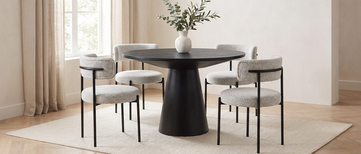 Savelli 47-Inch Round Black Oak Pedestal Dining Set with 4 Boucle Chairs in the room