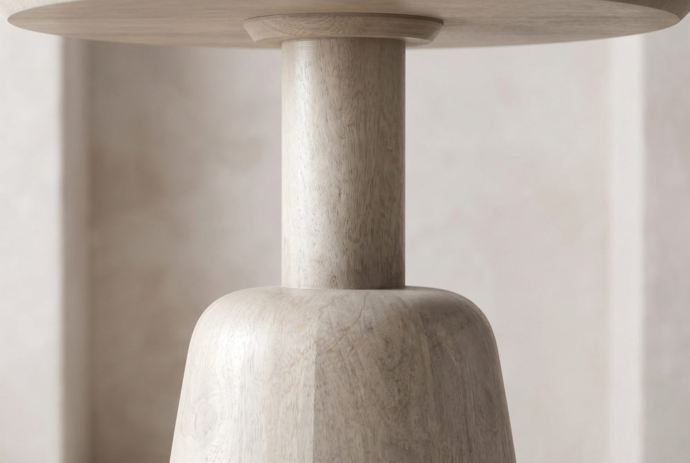 A slim neck on a rounded shoulder
