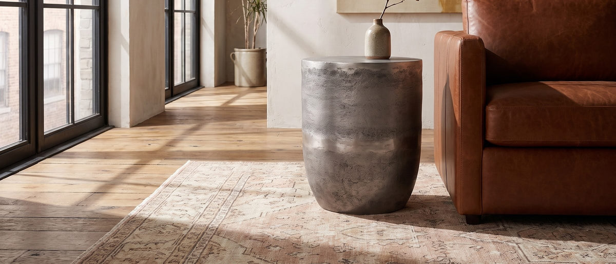 Sepino Antique Silver Metal Drum Side Table in the room