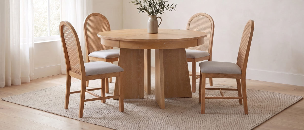 Siderno 42-Inch Extending Round Dining Set with 4 Chairs in the room