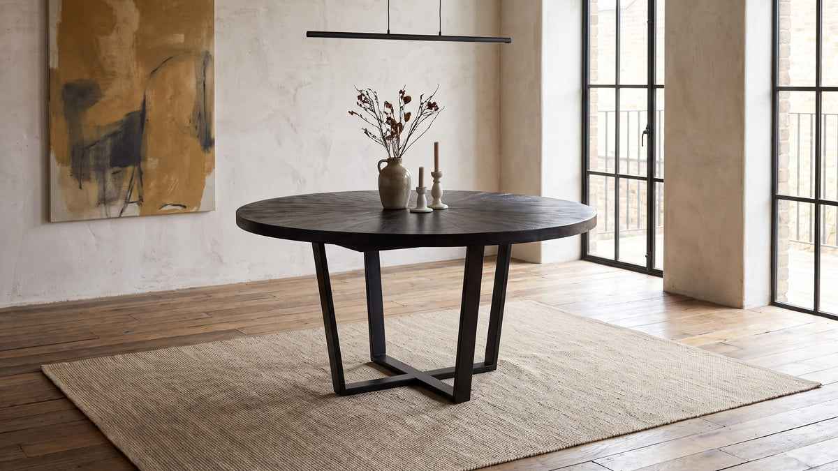 Black grain, pale plaster. - Soveria 63-Inch Round Black Acacia Sunburst Dining Table
