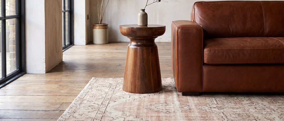 Specchia Brown Mango Cone Pedestal Side Table in the room
